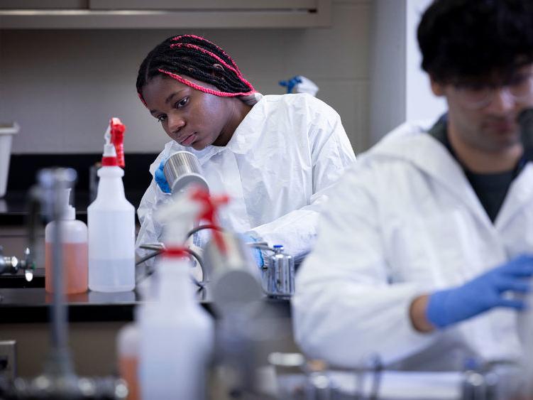 Student in a college laboratory